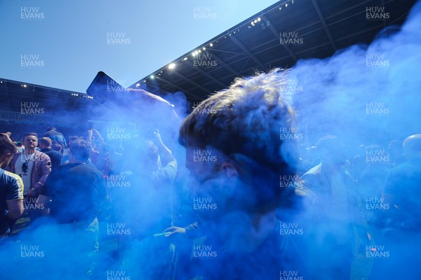 060518 - Cardiff City v Reading, Sky Bet Championship - Cardiff City fans celebrate with smoke flares after winning promotion to the Premier League