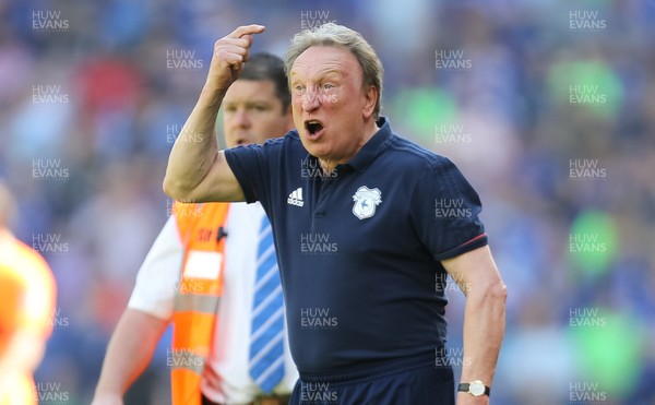 060518 - Cardiff City v Reading, Sky Bet Championship - Cardiff City manager Neil Warnock reacts to Cardiff fans who ran onto the pitch before the end of the match