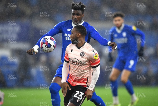 170223 - Cardiff City v Reading - EFL SkyBet Championship - Junior Hoilett of Reading is challenged by Sory Kaba of Cardiff City