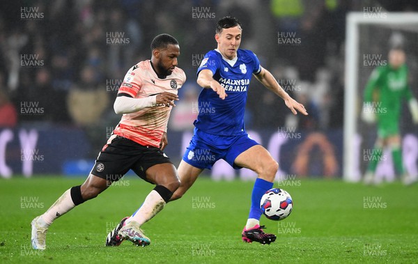 170223 - Cardiff City v Reading - EFL SkyBet Championship - Ryan Wintle of Cardiff City is tackled by Junior Hoilett of Reading