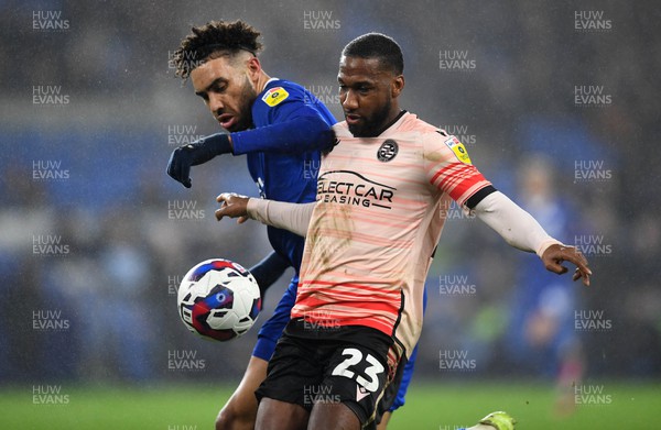 170223 - Cardiff City v Reading - EFL SkyBet Championship - Kion Etete of Cardiff City and Junior Hoilett of Reading compete
