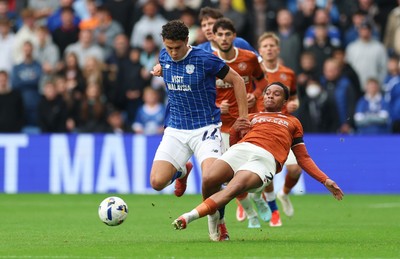 181025 - Cardiff City v Reading, EFL SkyBet League 1 - Yousef Salech of Cardiff City is tackled by Kelvin Abrefa of Reading