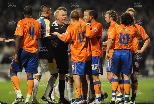 25.11.08 - Cardiff City v Reading - The Championship - Reading players surround the referee after Reading's Andre Bikey was shown a red card. 