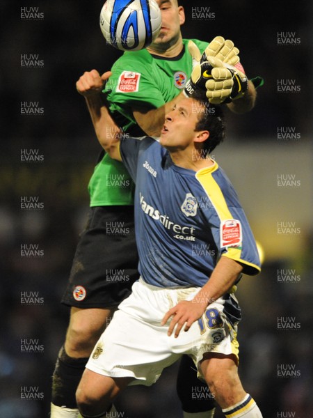 25.11.08 - Cardiff City v Reading - The Championship - Cardiff's Michael Chopra is tackled by Reading 'keeper Marcus Hahnemann resulting in a penalty which McCormack scores from. 