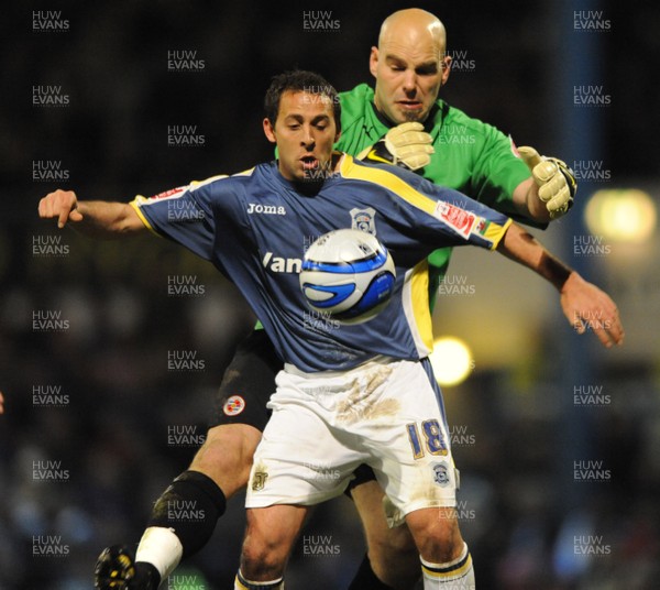 25.11.08 - Cardiff City v Reading - The Championship - Cardiff's Michael Chopra is tackled by Reading 'keeper Marcus Hahnemann resulting in a penalty which McCormack scores from. 