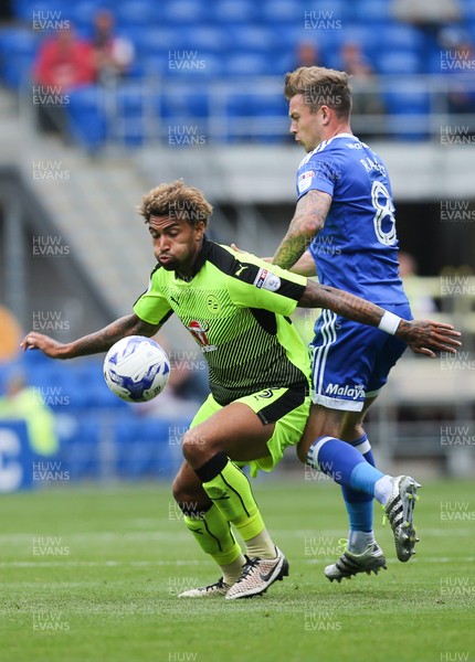 270816 - Cardiff City v Reading, Sky Bet Championship - Joe Ralls of Cardiff City and Danny Williams of Reading compete for the ball