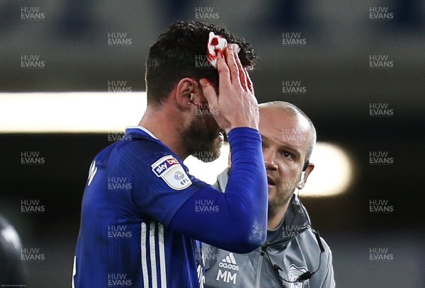 310120 - Cardiff City v Reading, Sky Bet Championship - Sean Morrison of Cardiff City receives treatment for a head injury