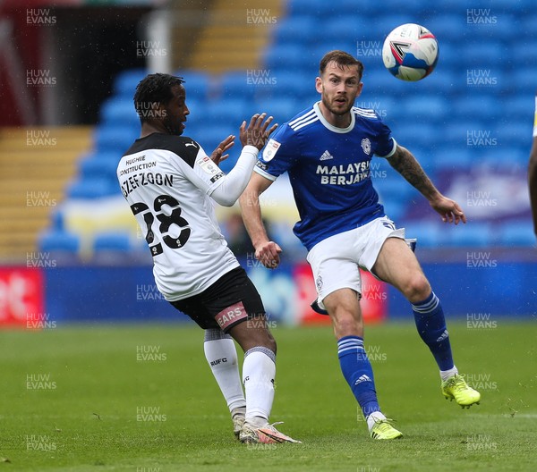 080521 - Cardiff City v Rotherham United, Sky Bet Championship - Joe Ralls of Cardiff City plays the ball past Florian Jozefzoon of Rotherham United