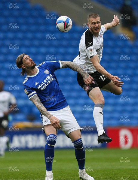 080521 - Cardiff City v Rotherham United, Sky Bet Championship - Aden Flint of Cardiff City and Michael Smith of Rotherham United compete for the ball