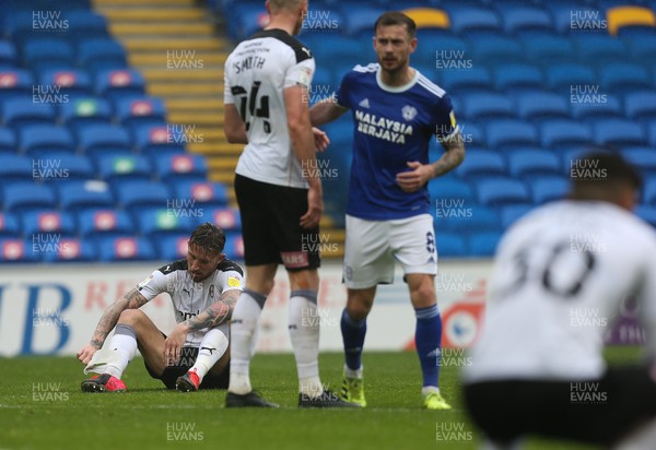 080521 - Cardiff City v Rotherham United, Sky Bet Championship - Rotherham players react at the end of the match as they wit for news from Pride Park to see if they are relegated