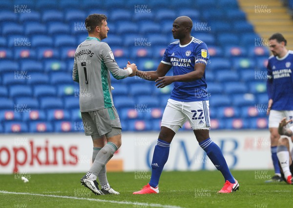 080521 - Cardiff City v Rotherham United, Sky Bet Championship - Sol Bamba of Cardiff City embraces Cardiff City goalkeeper Dillon Phillips at the end of the match