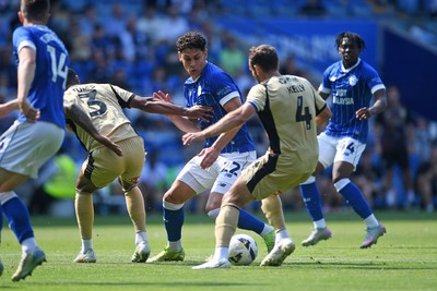160825 - Cardiff City v Rotherham United - Sky Bet League 1 - Yousef Salech of Cardiff City is challenged by Liam Kelly of Rotherham United
