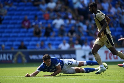 160825 - Cardiff City v Rotherham United - Sky Bet League 1 - Yousef Salech of Cardiff City goes to ground in the box after a challenge from Zak Jules of Rotherham United