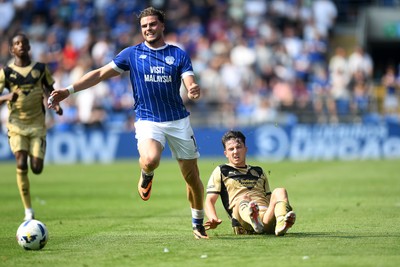 160825 - Cardiff City v Rotherham United - Sky Bet League 1 - Ollie Tanner of Cardiff City is challenged by Daniel Gore of Rotherham United