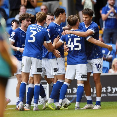 160825 - Cardiff City v Rotherham United - Sky Bet League 1 - Rubin Colwill of Cardiff City celebrates scoring the third goal of the match with team mates
