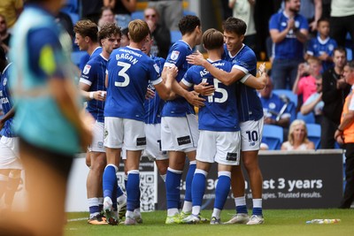 160825 - Cardiff City v Rotherham United - Sky Bet League 1 - Rubin Colwill of Cardiff City celebrates scoring the third goal of the match with team mates