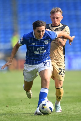 160825 - Cardiff City v Rotherham United - Sky Bet League 1 - Joel Colwill of Cardiff City is challenged by Jack Holmes of Rotherham United