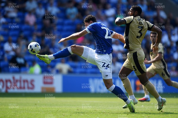 160825 - Cardiff City v Rotherham United - Sky Bet League 1 - Yousef Salech of Cardiff City goes to ground in the box after a challenge from Zak Jules of Rotherham United
