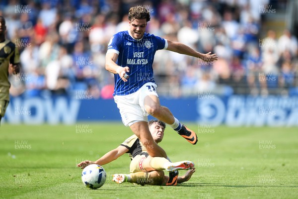 160825 - Cardiff City v Rotherham United - Sky Bet League 1 - Ollie Tanner of Cardiff City is challenged by Daniel Gore of Rotherham United