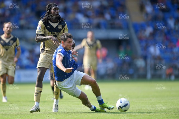 160825 - Cardiff City v Rotherham United - Sky Bet League 1 - Rubin Colwill of Cardiff City is challenged by Lenny Agbaire of Rotherham United