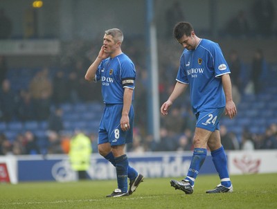 030104Cardiff City v Sheffield Utd, FA Cup 3rd round  Cardiff's Graham Kavanagh (lt) and Alan Lee leave the field  