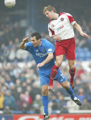 030104Cardiff City v Sheffield Utd, FA Cup 3rd round  Sheffield Utd's Robert Kozluk beats Cardiff's Peter Thorne   