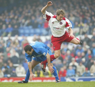 030104Cardiff City v Sheffield Utd, FA Cup 3rd round  Sheffield Utd's Robert Kozluk beats Cardiff's Peter Thorne   