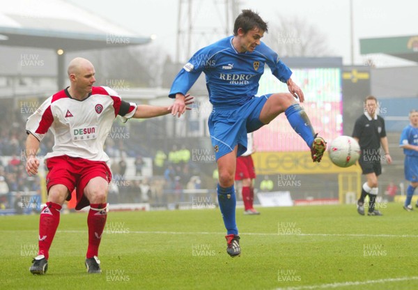 030104Cardiff City v Sheffield Utd, FA Cup 3rd round  Cardiff's Gareth Whalley controls the ball as Robert Page closes in  