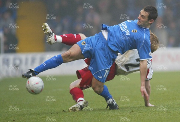 030104Cardiff City v Sheffield Utd, FA Cup 3rd round  Cardiff's Peter Thorne wins the ball from Robert Kozluk  