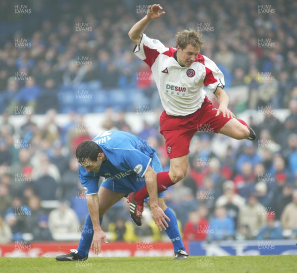 030104Cardiff City v Sheffield Utd, FA Cup 3rd round  Sheffield Utd's Robert Kozluk beats Cardiff's Peter Thorne   