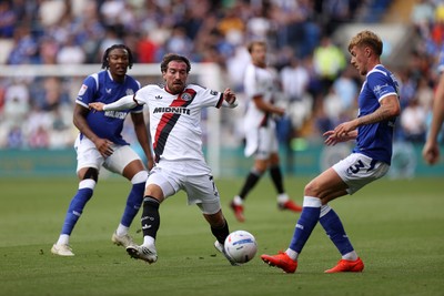 290826 - Cardiff City v Sheffield United - SkyBet Championship - Joe Rothwell of Sheffield United is challenged by Joel Bagan of Cardiff City 