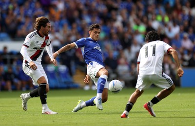 290826 - Cardiff City v Sheffield United - SkyBet Championship - Alex Robertson of Cardiff City is challenged by Joe Rothwell of Sheffield United 