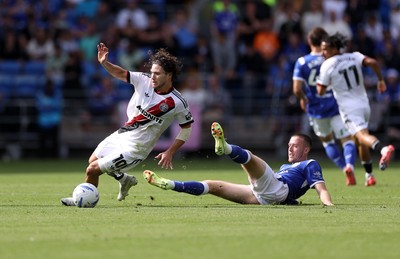 290826 - Cardiff City v Sheffield United - SkyBet Championship - Callum O'Hare of Sheffield United is tackled by Jack Moylan of Cardiff City 