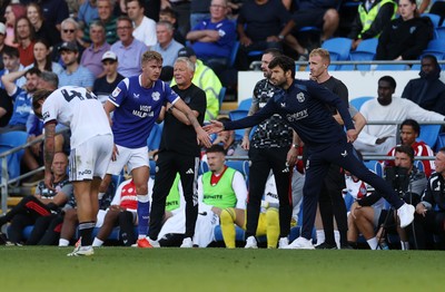 290826 - Cardiff City v Sheffield United - SkyBet Championship - Joel Bagan of Cardiff City and Cardiff City Manager Brian Barry-Murphy 