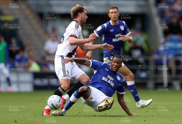 290826 - Cardiff City v Sheffield United - SkyBet Championship - Patrick Bamford of Sheffield United is tackled by Alex Robertson of Cardiff City 