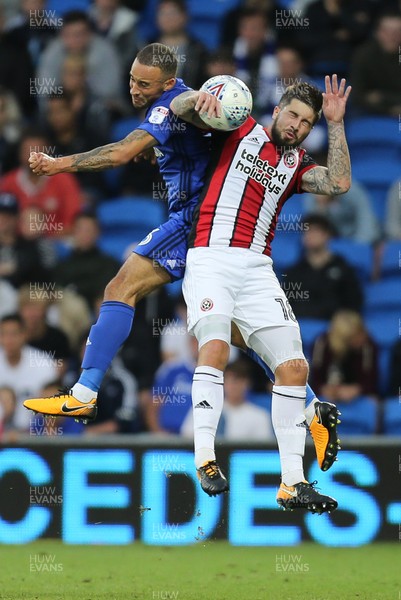 150817 - Cardiff City v Sheffield United, Sky Bet Championship - Jazz Richards of Cardiff City and Kieron Freeman of Sheffield United compete for the ball