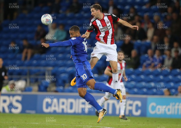 150817 - Cardiff City v Sheffield United, Sky Bet Championship - Chris Basham of Sheffield United and Kenneth Zohore of Cardiff City compete for the ball