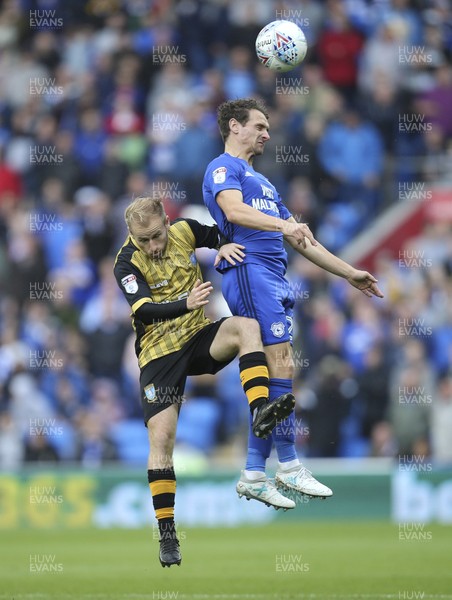 160917 - Cardiff City v Sheffield Wednesday, SkyBet Championship - Craig Bryson of Cardiff City and Barry Bannan of Sheffield Wednesday compete for the ball