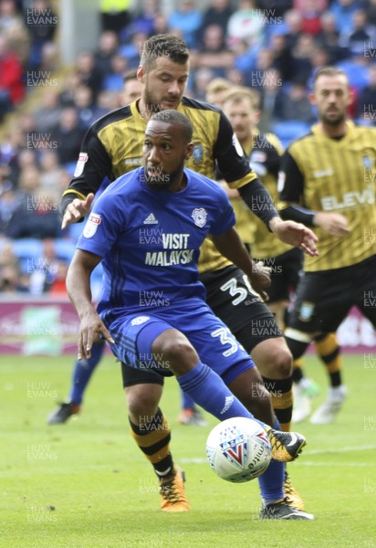 160917 - Cardiff City v Sheffield Wednesday, SkyBet Championship - Junior Hoilett of Cardiff City holds off the challenge from Daniel Pudil of Sheffield Wednesday