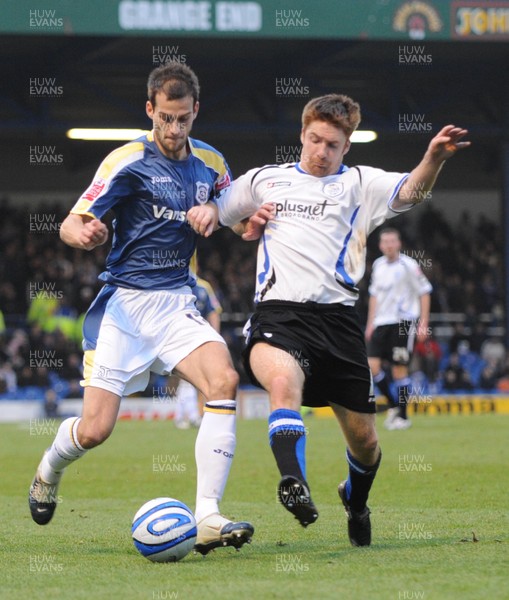 20.12.08 - Championship Football -  Cardiff City v Sheffield Wednsday -  Cardiff's Roger Johnson and Sheffield's James O'Connor compete 