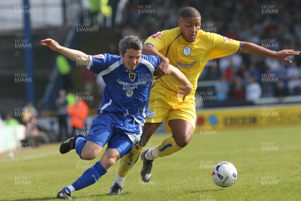 07.04.07... Cardiff City v Sheffield Wednesday, Coca Cola Championship. Cardiff's Kevin McNaughton tangles with Sheffield Wednesdays' Leon Clarke 