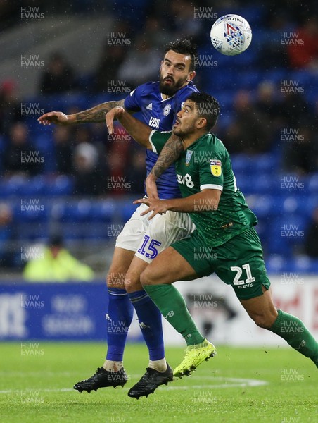181019 - Cardiff City v Sheffield Wednesday, Sky Bet Championship - Marlon Pack of Cardiff City and Massimo Luongo of Sheffield Wednesday compete for the ball