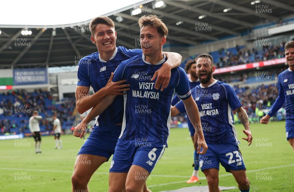 260823 - Cardiff City v Sheffield Wednesday, Sky Bet Championship - Ryan Wintle of Cardiff City celebrates along with Rubin Colwill of Cardiff City after he shoots to score from the penalty spot