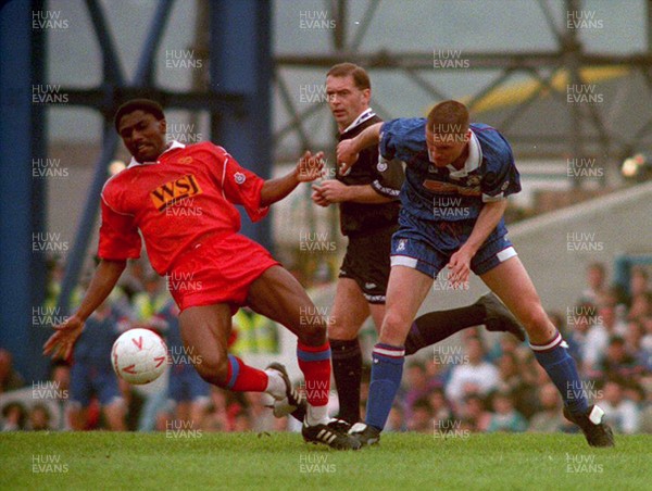 010593 - Cardiff City v Shrewsbury - League Division 3 -  Derek Brazil of Cardiff is tackled by Mark Taylor