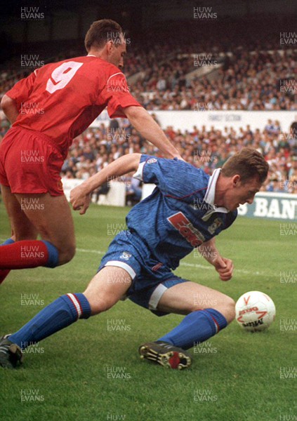 010593 - Cardiff City v Shrewsbury - League Division 3 -  Carl Dale of Cardiff slips inside Robbie Turner