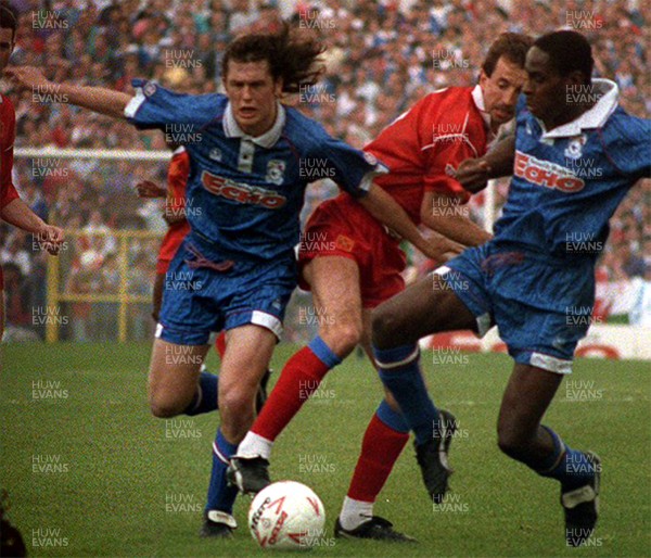 010593 - Cardiff City v Shrewsbury - League Division 3 -  Nicky Richardson (lt) and Nathan Blake (rt) of Cardiff beat Kevin Summerfield