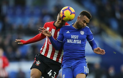 081218 - Cardiff City v Southampton, Premier League - Josh Murphy of Cardiff City and Yan Valery of Southampton compete for the ball