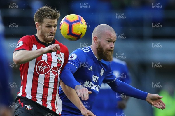 081218 - Cardiff City v Southampton, Premier League - Aron Gunnarsson of Cardiff City and Stuart Armstrong of Southampton compete for the ball