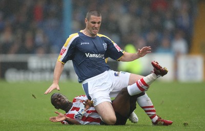 09.08.08 -  Cardiff City v Southampton, Coca Cola Championship -  Cardiff's Mark Kennedy is tackled by Southampton's Nathan Dyer 