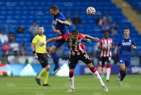 270721 - Cardiff City v Southampton, Pre-season Friendly - James Collins of Cardiff City and Jan Bednarek of Southampton compete for the ball